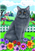 Grey Maine Coon cat sitting in the grass with flowers garden flag.