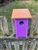 Purple Blue Bird House with a cedar color roof made of composite material.  Hand made by a craftsman in the USA.