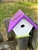 White Wren House with a purple roof made of composite material.  Hand made by a craftsman in the USA.