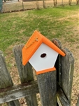 White Wren House with an orange roof made of composite material.  Hand made by a craftsman in the USA.