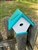 White Wren House with a teal roof made of composite material.  Hand made by a craftsman in the USA.