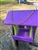 Purple And Green Bird Feeder made of composite material. Holds 1 quart of seed. Hand made by a craftsman in the USA.