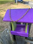 Purple And Green Bird Feeder made of composite material. Holds 1 quart of seed. Hand made by a craftsman in the USA.