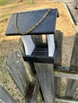 Black And White Bird Feeder made of composite material. Holds 1 quart of seed. Hand made by a craftsman in the USA.