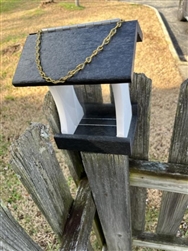 Black And White Bird Feeder made of composite material. Holds 1 quart of seed. Hand made by a craftsman in the USA.