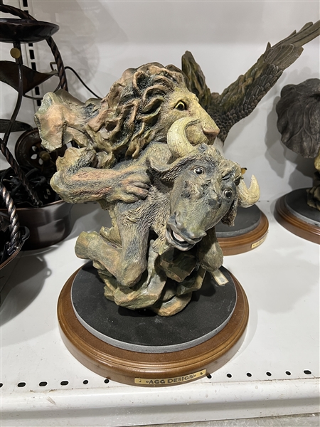 Lion Catching a Wildebeest AGG Design Sculpture