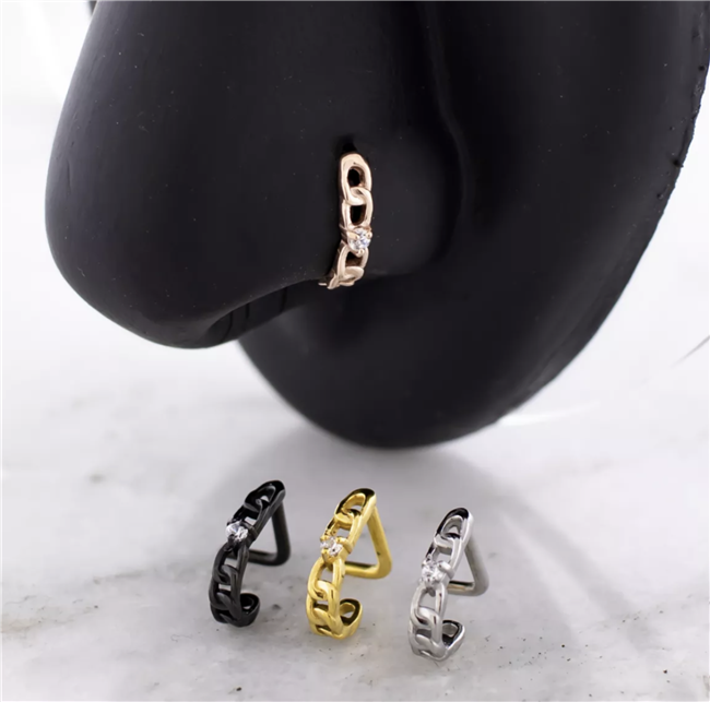 STEEL NOSE CURVE W/ CHAIN WRAP AND PRONG SET CUBIC ZIRCONIA CENTER