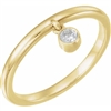 This 14k yellow gold bezel set diamond ring features a single round brilliant cut diamond.