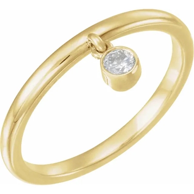 This 14k yellow gold bezel set diamond ring features a single round brilliant cut diamond.