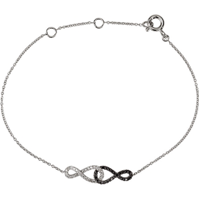 A black diamond infinity symbol greets a white diamond infinity symbol in this harmonious 14k white gold diamond tennis style bracelet.