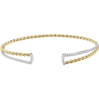 This 14k yellow gold cuff bangle bracelet features a beaded 14k white gold front section connected by a 14k yellow gold twisted rope.