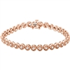 This 14k rose gold diamond tennis bracelet comes stacked with 1 full carat of round brilliant diamonds shimmering on your wrist.