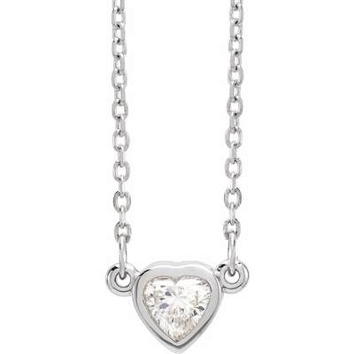 This 14k white gold diamond heart necklace features a 0.25 carat heart shaped diamond at its center.