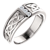 A celtic designed 14k white gold men's ring with three round brilliant diamonds.