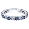 Round diamonds and sapphires alternate in this shimmering 14k white gold eternity band!