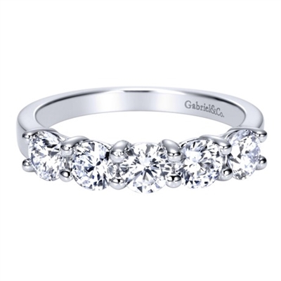 Diamonds and 14k white gold form a perfect partnership, mirroring you and your partner's! Featured with 5 round diamonds with a total diamond weight of 1.25 carats in this traditional diamond wedding band.