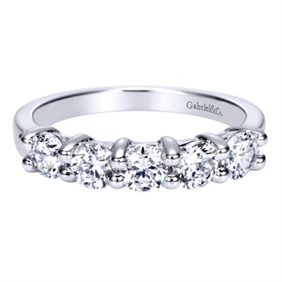 Round brilliant diamonds fill this 14k white gold wedding band with 0.99 carats of diamond shine.