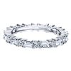 With round and baguette cut diamonds, this 1.25 carat eternity band set in 14k white gold is a delightfully unique piece of wedding jewelry.