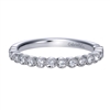 This simple and stylish diamond wedding band is featured in 14k white gold, to go along with 0.17 carats of round brilliant diamonds.