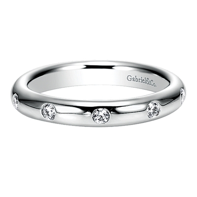 This 14k white gold diamond wedding band features one quarter carats of round brilliant diamonds wrapping all around your finger.