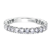 Sultry round diamonds glisten along her finger with over 1 carat of round diamonds shimmering in this unique white gold diamond band!