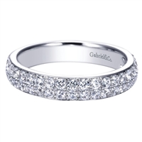 This diamond band blossoms with over 3/4 carats of high quality round diamond shimmer! Good for the wedding day or to celebrate an anniversary!