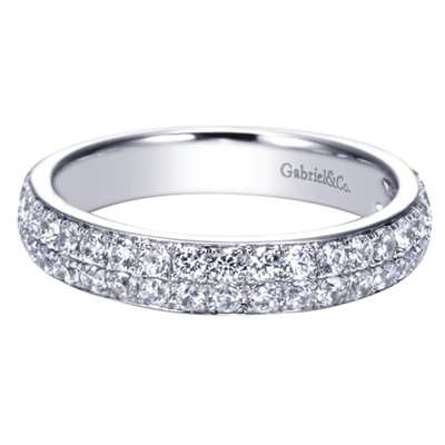 This diamond band blossoms with over 3/4 carats of high quality round diamond shimmer! Good for the wedding day or to celebrate an anniversary!