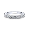 A 14k white gold diamond wedding ring laden with 0.95 carats of diamond shine.