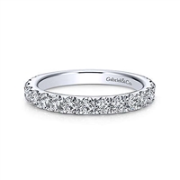 A 14k white gold diamond wedding ring laden with 0.95 carats of diamond shine.