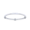 This gorgeous and sophisticated white gold diamond bangle features nearly 1 carat of brilliant round diamonds that sparkle.