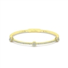 This 14k yellow gold diamond bangle bracelet showcases 0.92 carats of round brilliant diamonds set in warm 14k yellow gold.