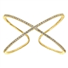 Shimmering diamonds glisten in this 14k yellow gold diamond cuff in an x shape.