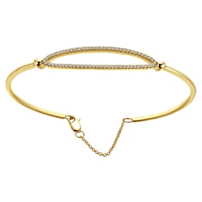 This simple diamond bangle is offered in 14k yellow gold, featuring 0.31 carats of shimmering round diamonds set in a split style, with an oval shape.