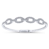 1.38 carats of brilliant diamond shine are set into this 14k white gold cuff bangle.