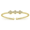 12 round brilliant diamonds shine with 0.61 carats all in this 14k yellow gold cuff bracelet.