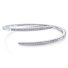A diamond bangle featuring 0.94 carats of diamond shimmer in 14k white gold.