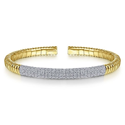 This 14k yellow gold cuff bangle features 2 carats of diamonds.