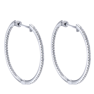 This fantastic classic diamond hoop is studded with three quarter carats of round brilliant diamond shine!
