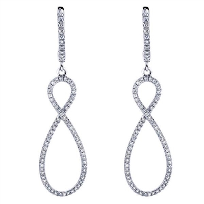 This figure 8 style 14k white gold pair of diamond earrings hangs gracefully and is a beautiful accessory for any woman.