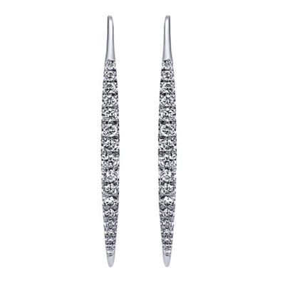 These drop earrings in 14k white gold shimmer with one half carat of round diamond brilliance, from the dagger shape to the funky way they are secured, this pair of trendy earrings has it all.