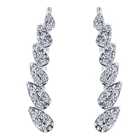 These stylish cascading pear diamond cuff earrings feature nearly one quarter carats of round brilliant diamonds in a familiar pattern.