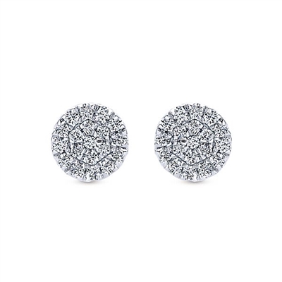 Set in a cluster style setting, 0.11 carats of diamonds in 14k white gold stud earrings.