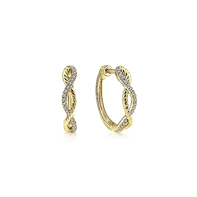 This pair of 14k yellow gold diamond hoop earrings features 0.11 carats of diamond shine.