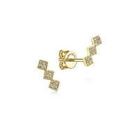 These 14k yellow gold diamond stud earrings feature 0.04 carats of diamonds.