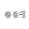 A diamond hexagon halo stud earring featuring 0.51 carats of diamonds in 14k white gold.