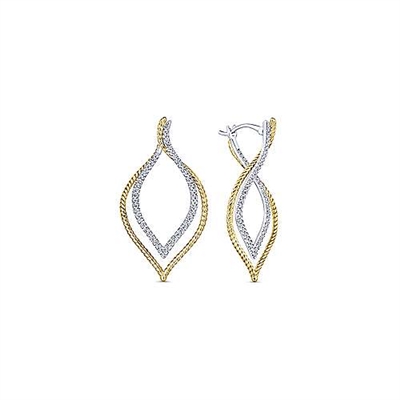 14k white and yellow gold diamond layered hoops with 0.65 carats of diamonds.