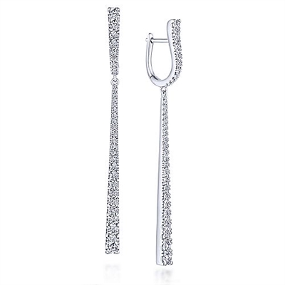 These stunning 18k white gold diamond drop earrings feature 1.65 carats of diamond showcased in an elegant tapered bar.