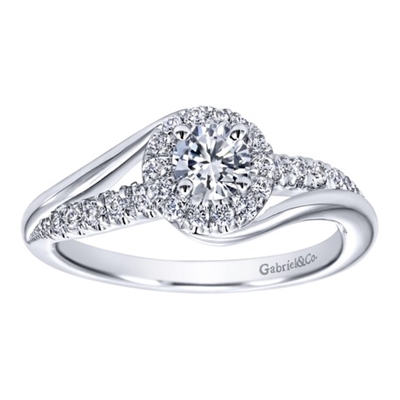 This freely styled round diamond engagement ring set up for a round center diamond shimmers with with one quarter carats of round brilliant diamonds is available in white gold or platinum.