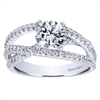This round brilliant diamond engagement ring with a fresh new design shows off a round center diamond in the middle of over one half carats of round brilliant diamonds.