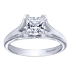 This white gold or platinum engagement ring fits a princess cut diamond and features a split shank, with a classic and traditional solitaire look.